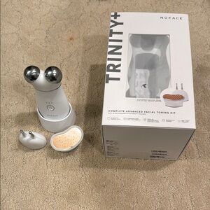 NuFace Silver and White Facial Toning Device